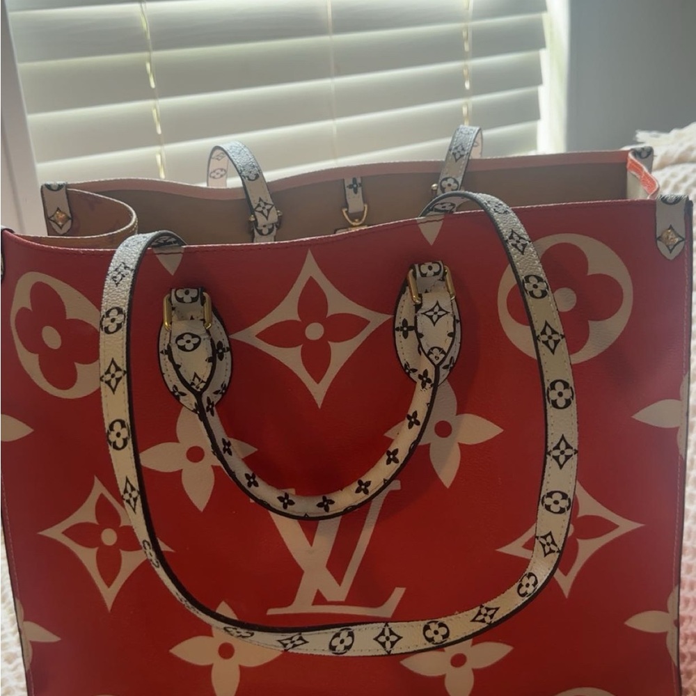 Louis Vuitton Red Tote Bag with Iconic Design